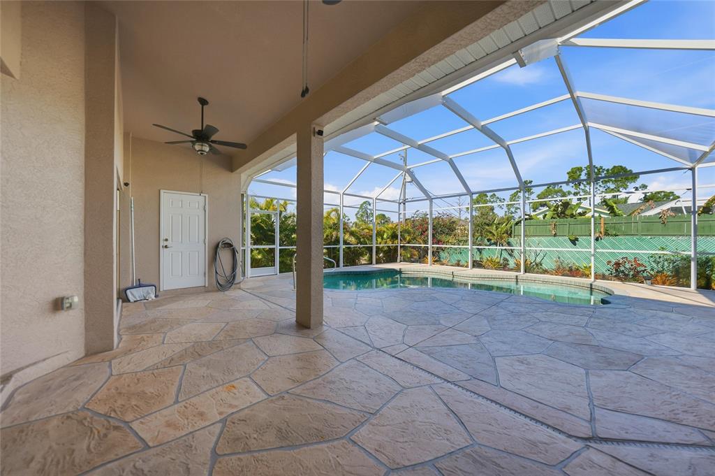 5455 Graves Terrace Port Charlotte, FL 33981 - Photo 44 of 54 a view of a house with backyard and a yard