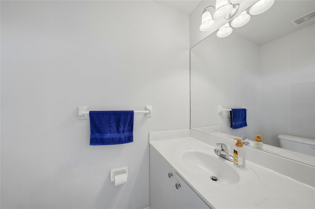 5455 Graves Terrace Port Charlotte, FL 33981 - Photo 45 of 54 a bathroom with a sink and a mirror