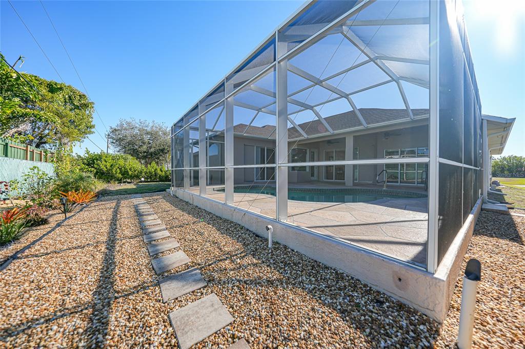 5455 Graves Terrace Port Charlotte, FL 33981 - Photo 48 of 54 a view of a house with a backyard