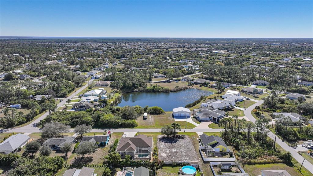 5455 Graves Terrace Port Charlotte, FL 33981 - Photo 52 of 54 an aerial view of a city with lots of residential buildings
