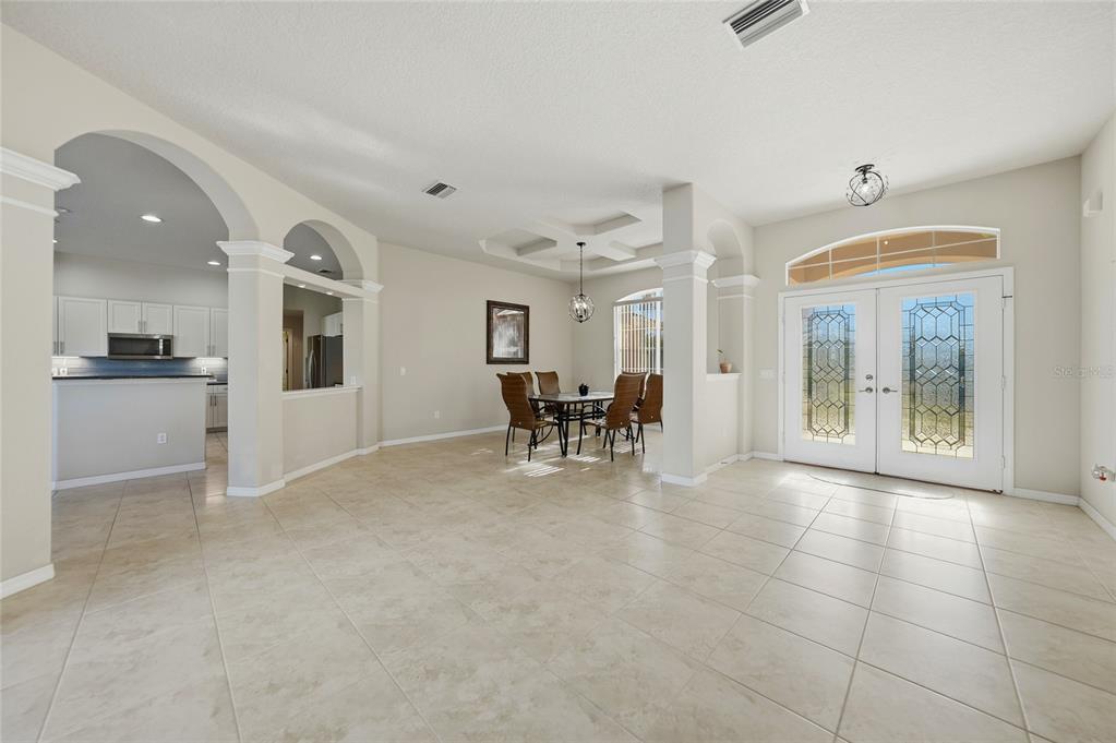 5455 Graves Terrace Port Charlotte, FL 33981 - Photo 7 of 54 a view of a livingroom with furniture and a kitchen