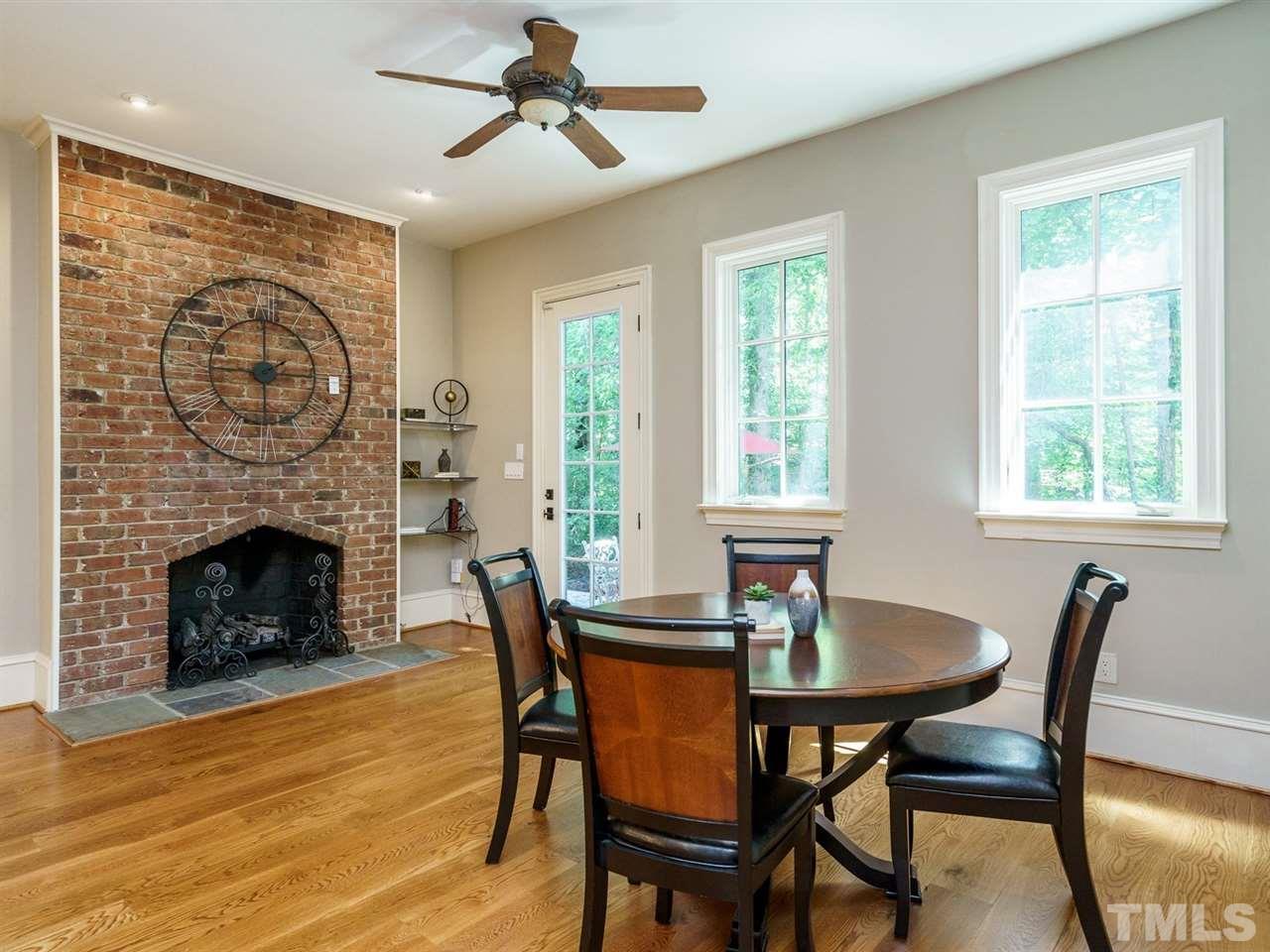 605 Queensferry Road Cary, NC 27511 - Photo 8 of 25 a view of a dining room with furniture window and wooden floor
