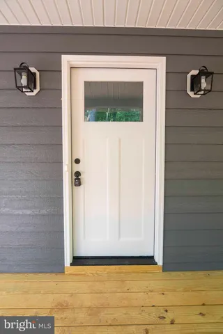a kitchen with a sink stove and refrigerator