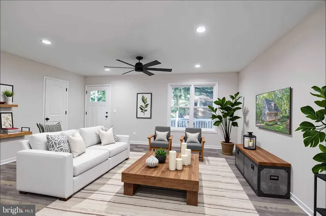 a kitchen with kitchen island a stove a sink and a refrigerator