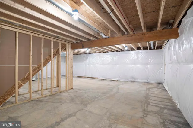a view of a wooden deck with chairs and a yard