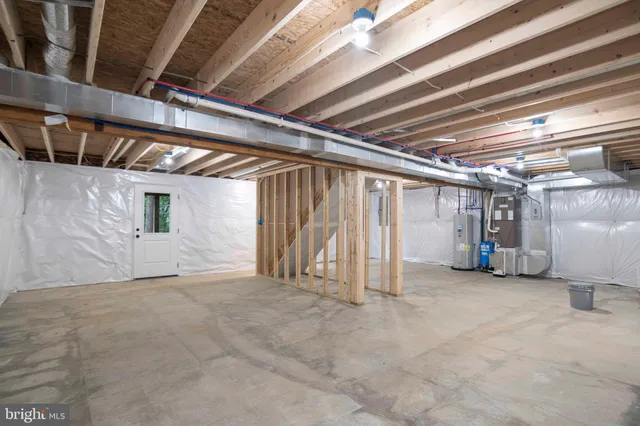 a view of a green field with a lake view