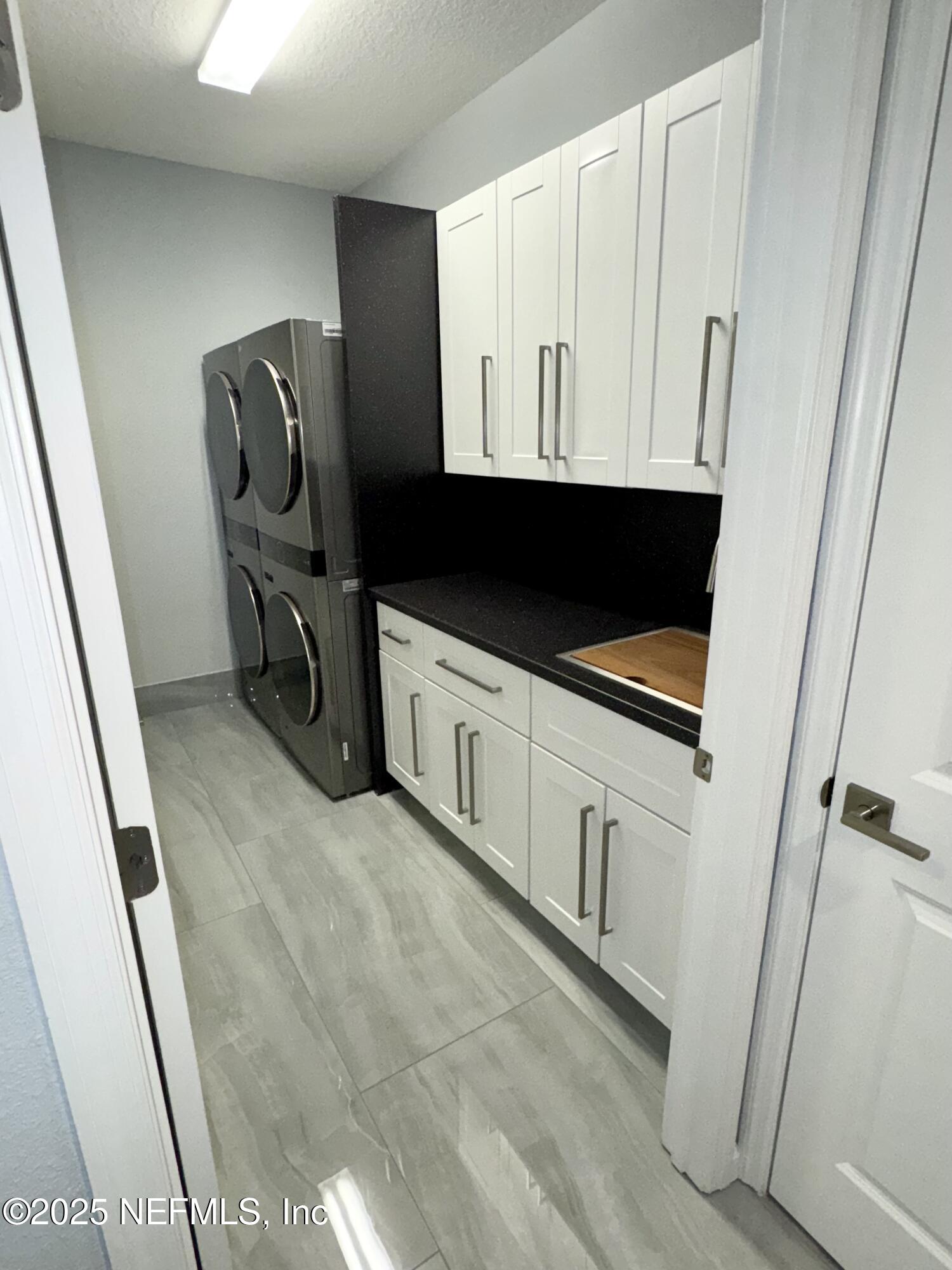 163 Pine Forest Court St. Augustine, FL 32092 - Photo 54 of 85 a view of kitchen with wooden floor and electronic appliances
