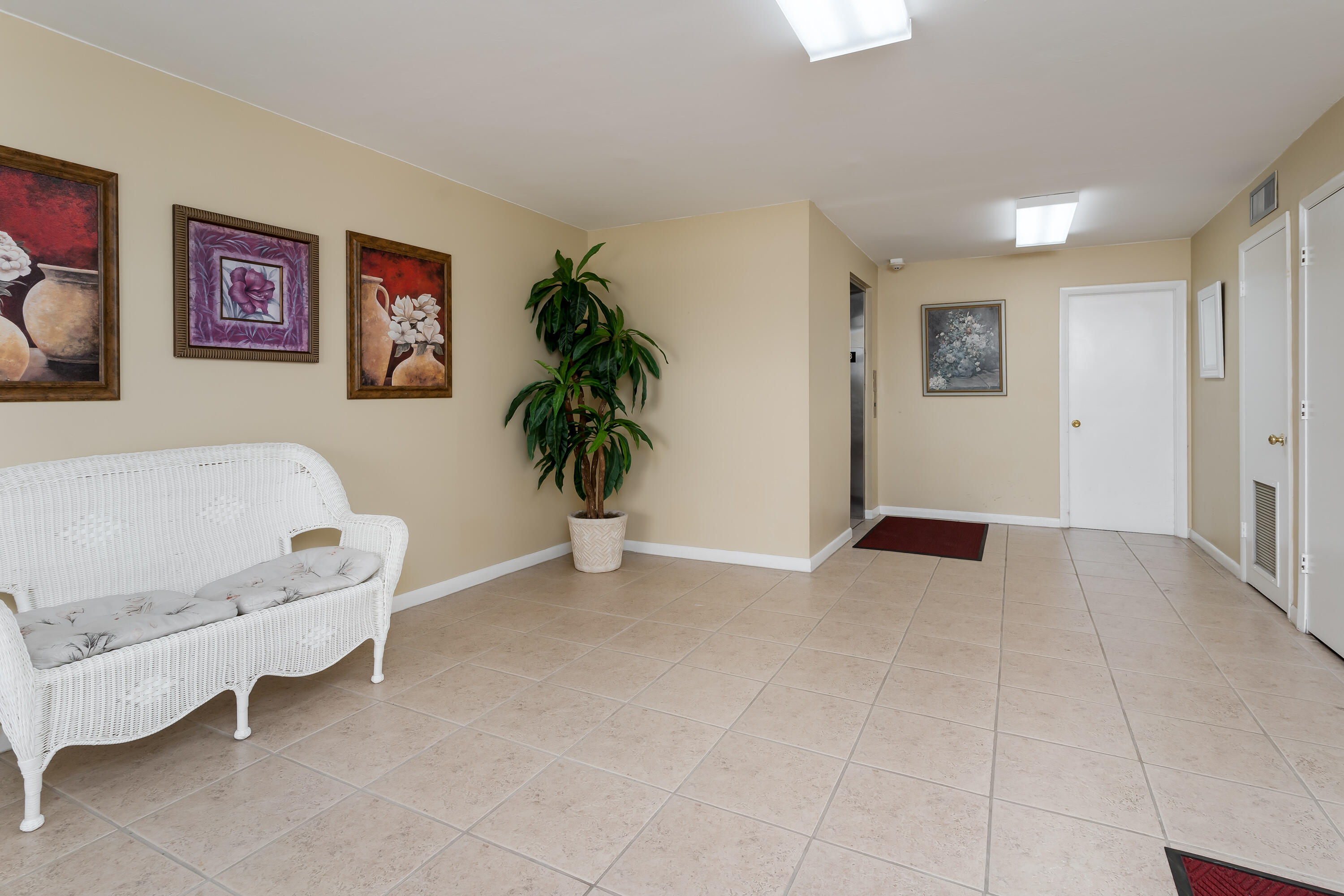 1010 Manatee Road, Unit B 305 Naples, FL 34114 - Photo 16 of 23 a view of livingroom with furniture and a potted plant