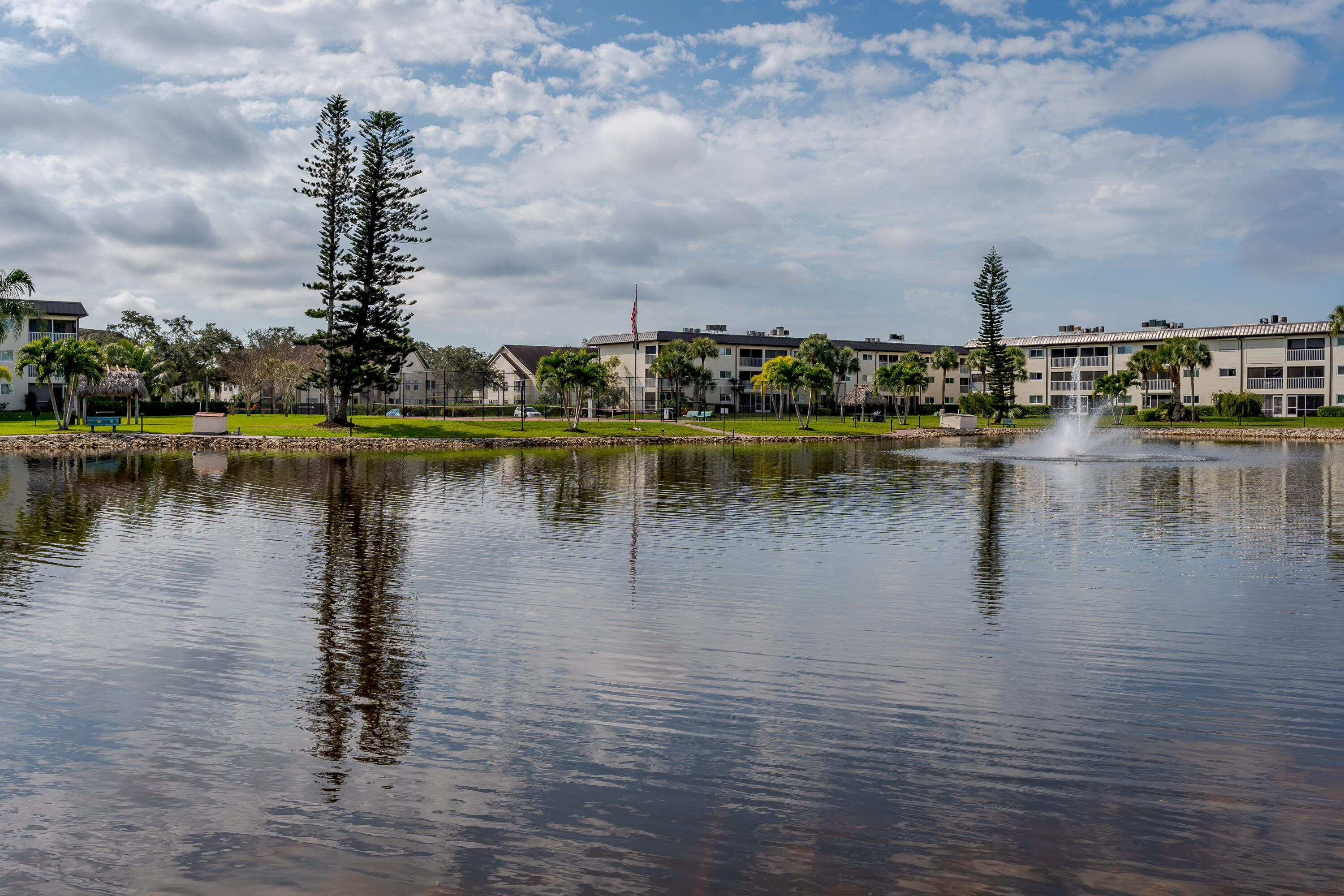 1010 Manatee Road, Unit B 305 Naples, FL 34114 - Photo 23 of 23 a view of a lake with houses