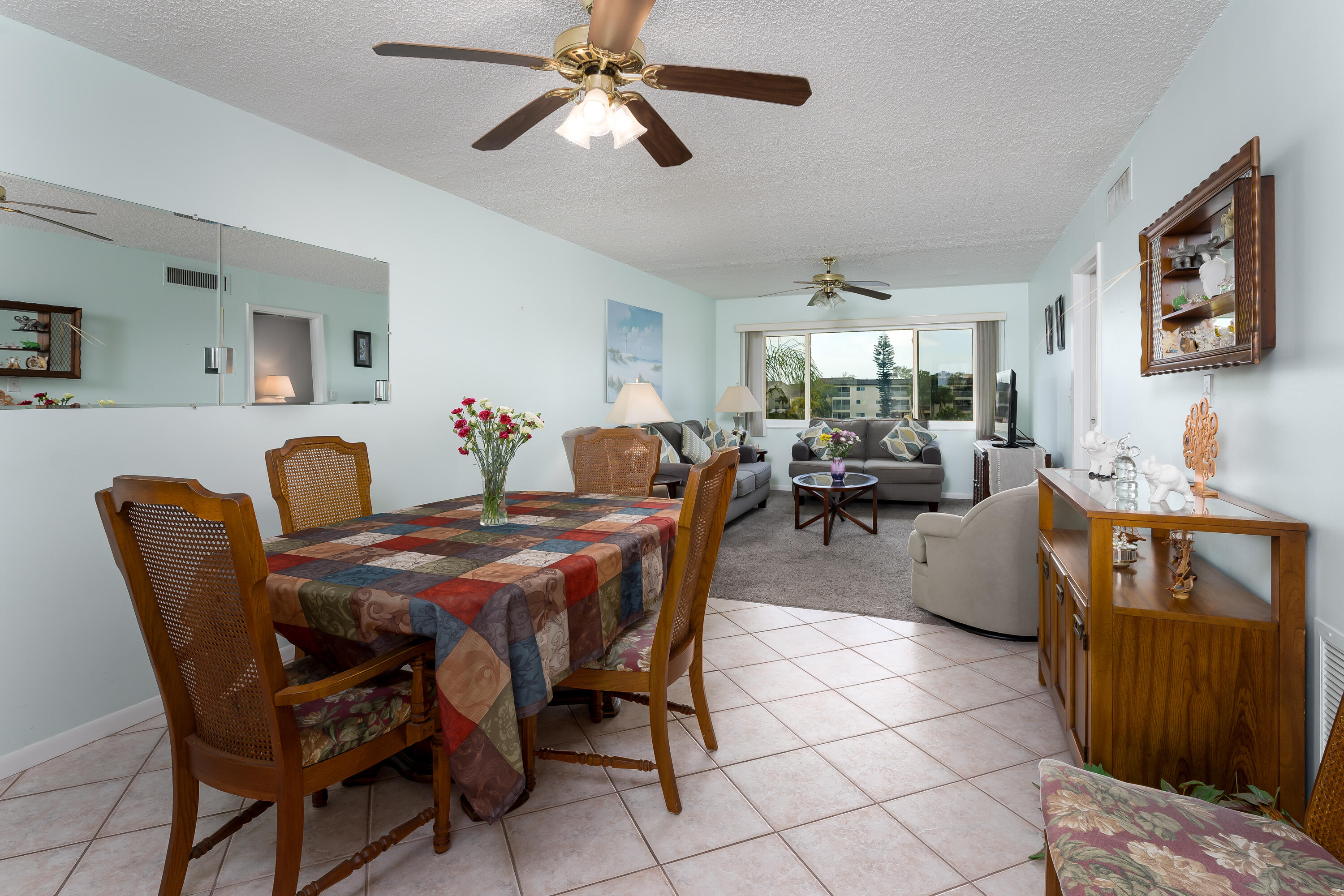 1010 Manatee Road, Unit B 305 Naples, FL 34114 - Photo 3 of 23 a dining room with furniture and window