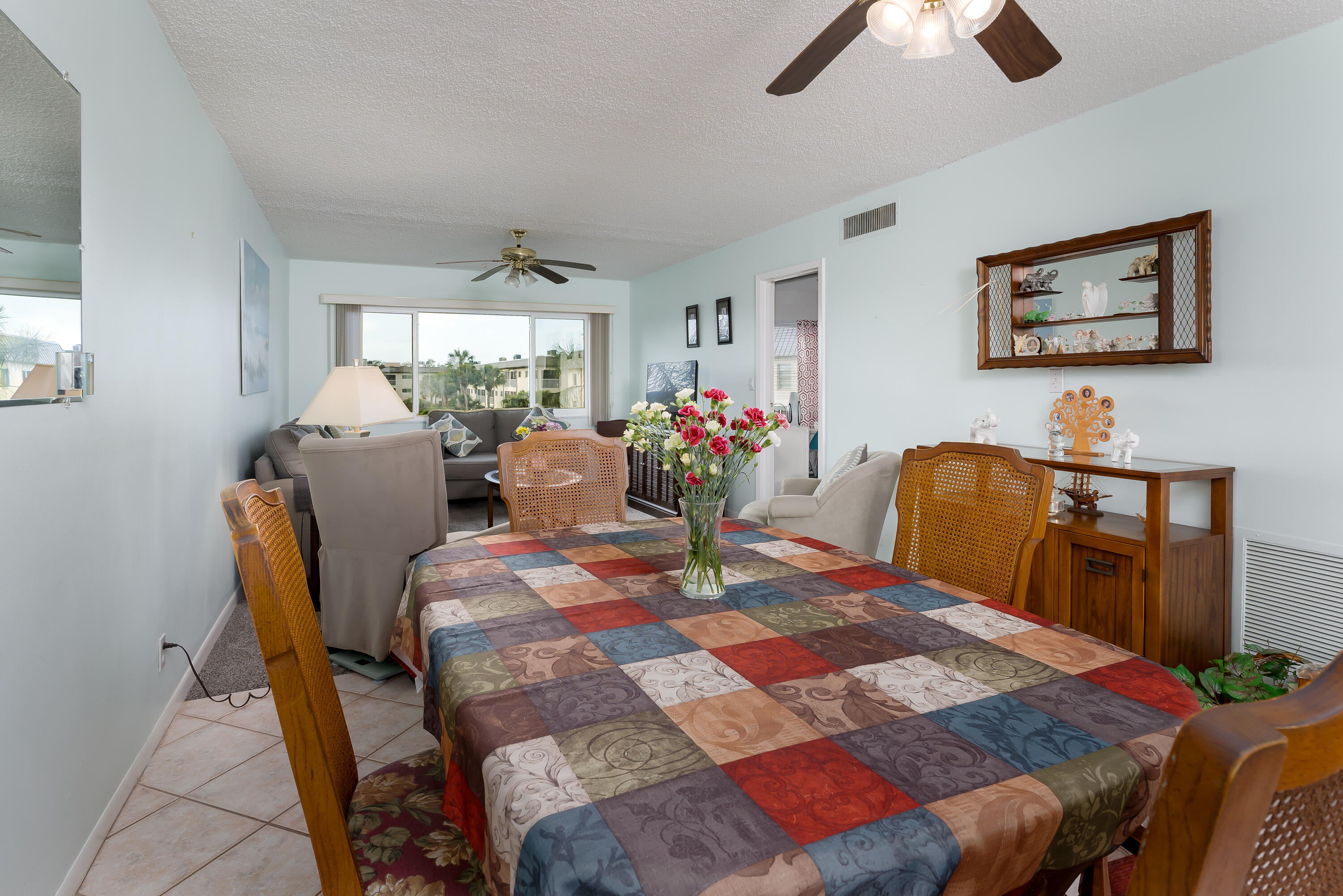 1010 Manatee Road, Unit B 305 Naples, FL 34114 - Photo 7 of 23 a view of a dining room with furniture