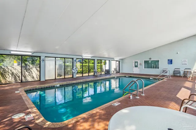 a view of a house with swimming pool