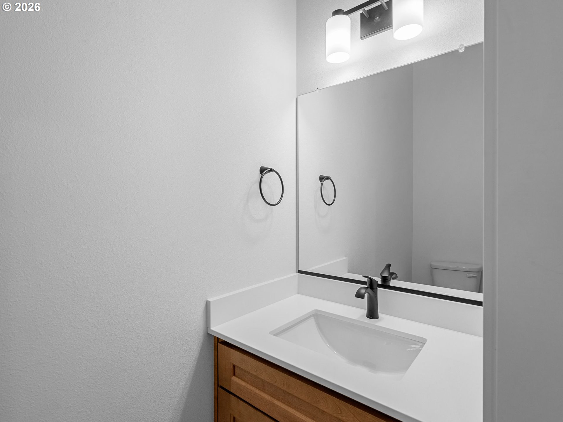 2250 Northeast 207th Place Fairview, OR 97024 - Photo 27 of 36 a bathroom with a sink and a mirror