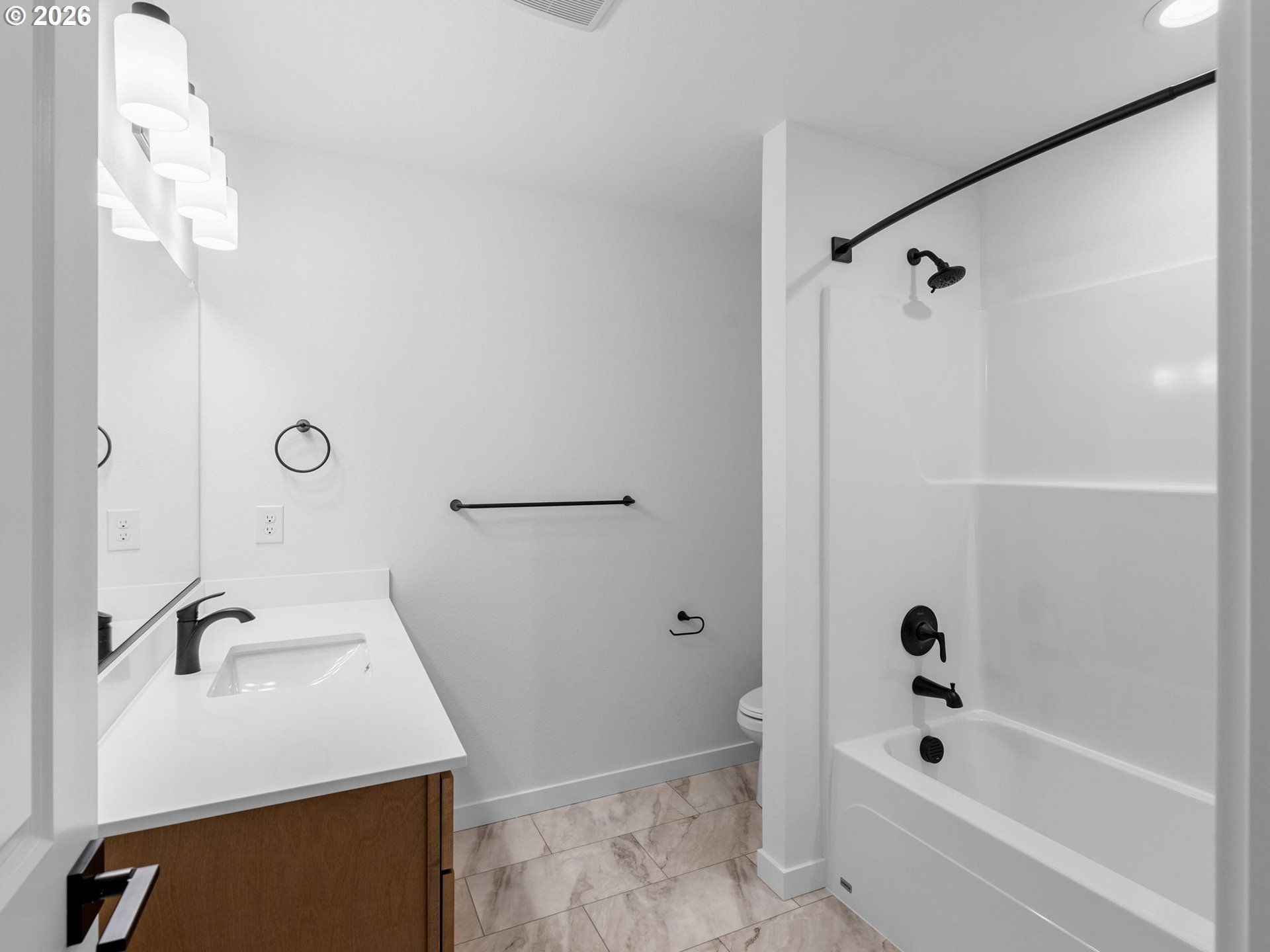2250 Northeast 207th Place Fairview, OR 97024 - Photo 32 of 36 a bathroom with a sink a mirror toilet and bathtub