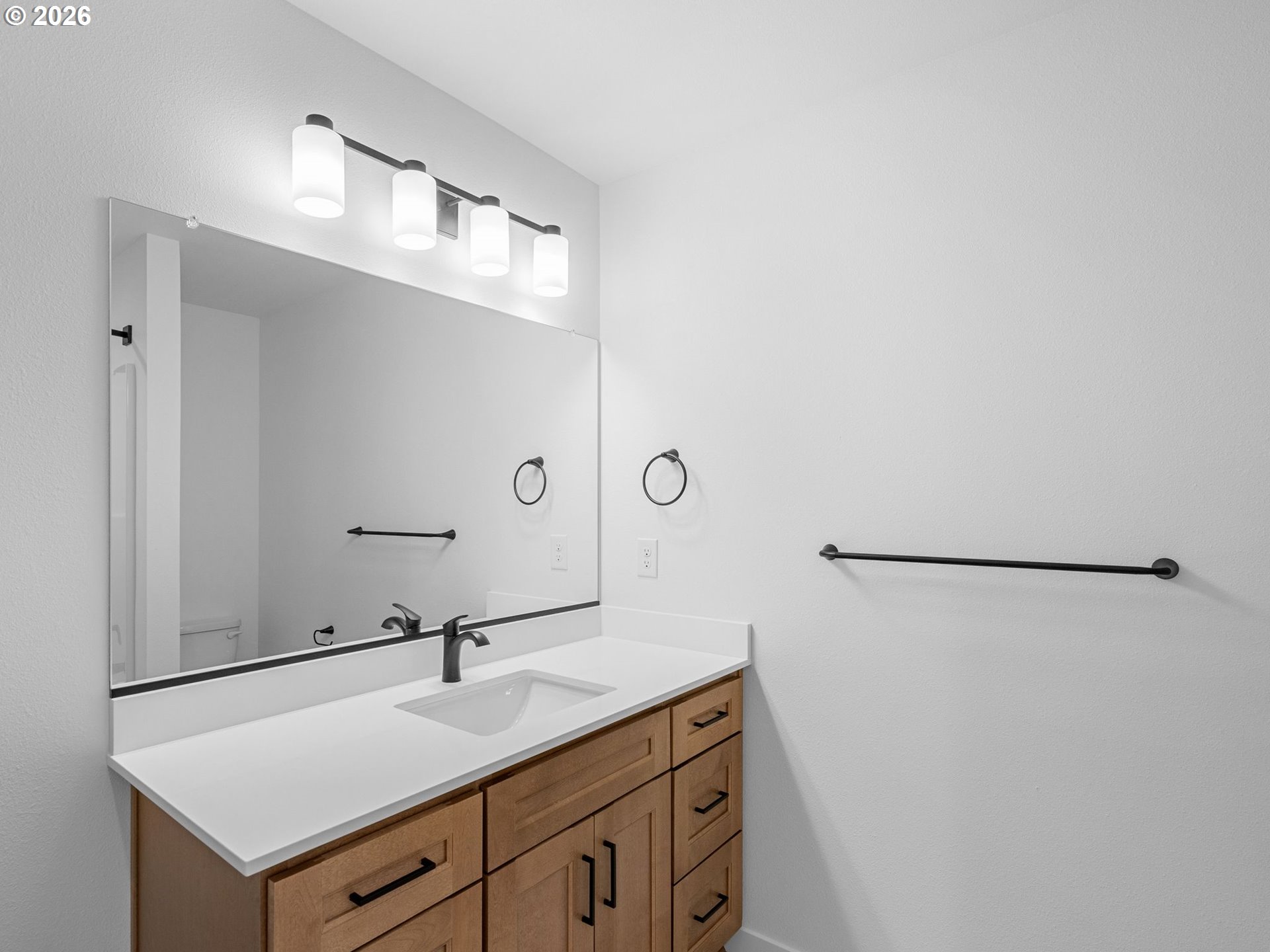 2250 Northeast 207th Place Fairview, OR 97024 - Photo 33 of 36 a bathroom with a sink and a mirror