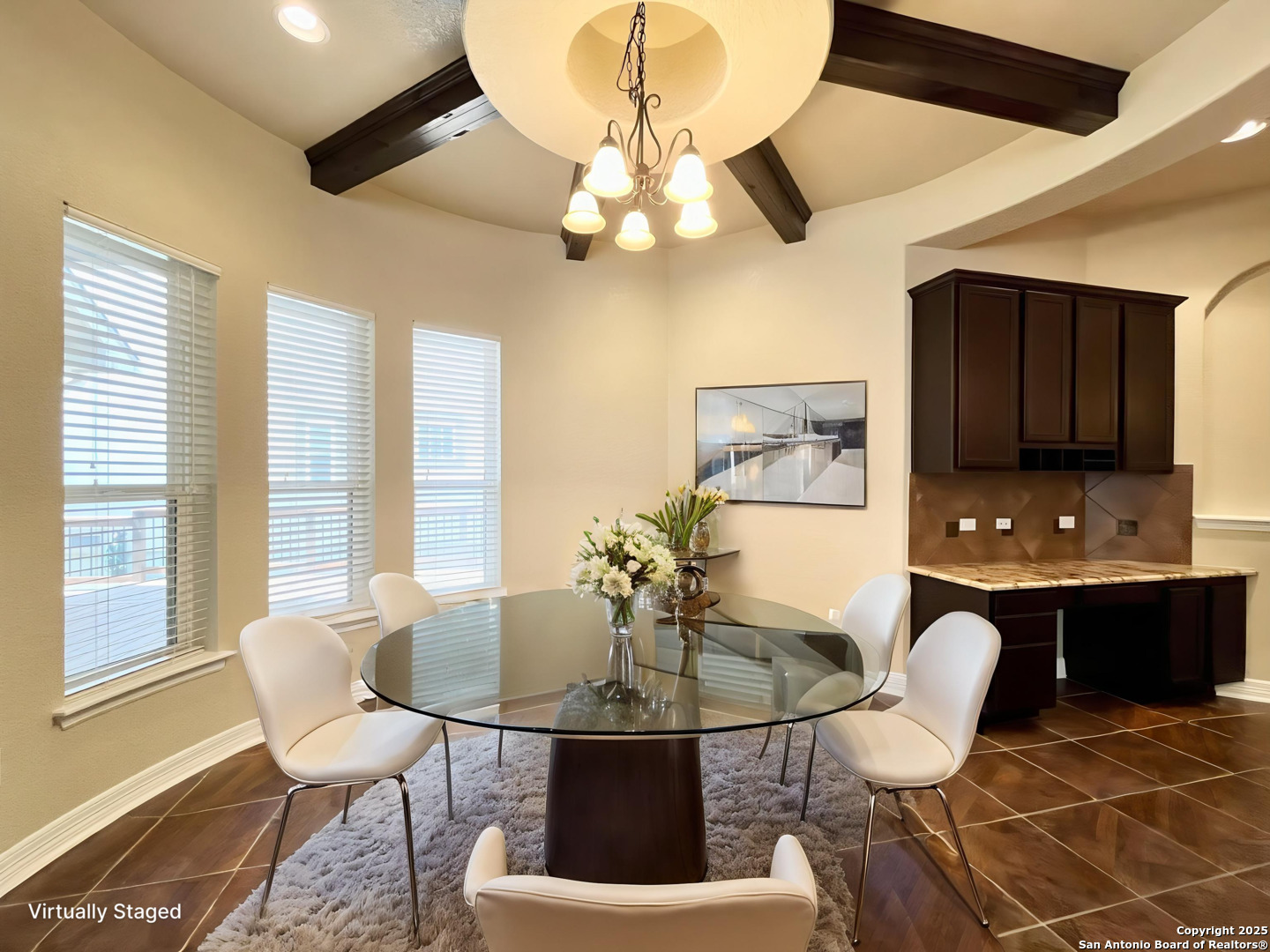 8123 Poconos Run San Antonio, TX 78255 - Photo 3 of 47 a view of a dining room with furniture and chandelier