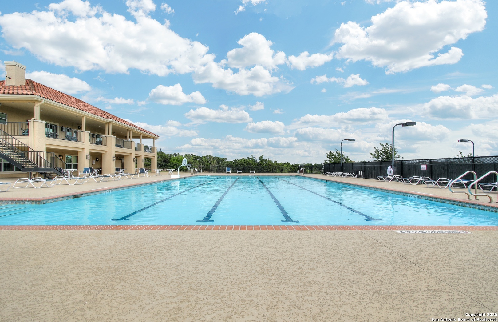 8123 Poconos Run San Antonio, TX 78255 - Photo 43 of 47 a view of a swimming pool with a yard