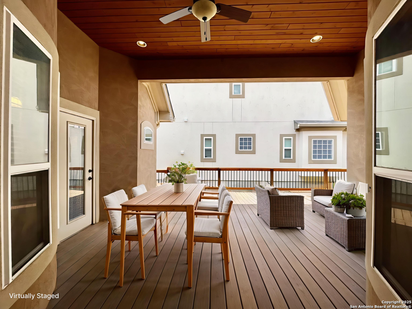 8123 Poconos Run San Antonio, TX 78255 - Photo 5 of 47 a view of a dining room with furniture window and wooden floor