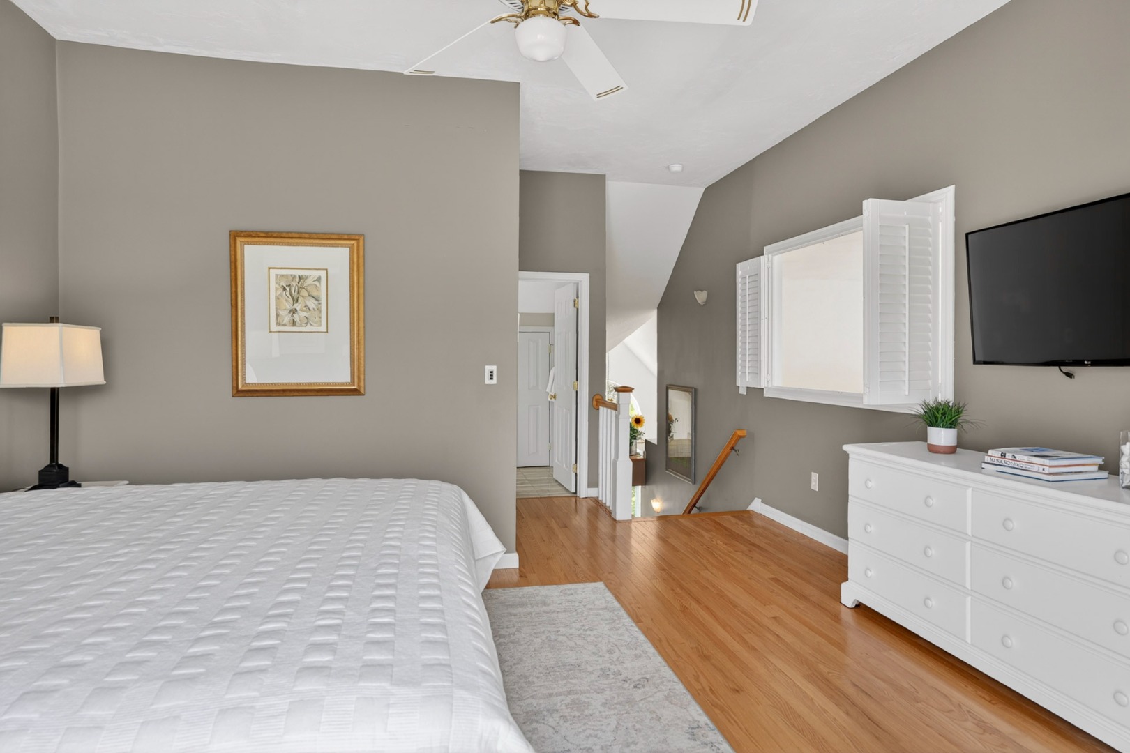 9 Thaxter Lane Edgartown, MA 02539 - Photo 26 of 53 a bedroom with a bed window and a flat screen tv