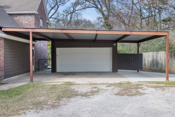 12 Raven's Nest Bryan, TX 77808 - Photo 34 of 46 a backyard of a house with a shaded area