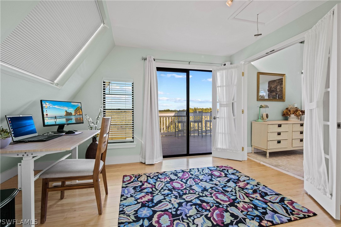 705 Rabbit Road Sanibel, FL 33957 - Photo 15 of 35 a bedroom with furniture and a window