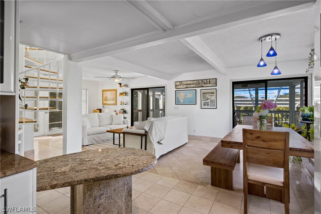 705 Rabbit Road Sanibel, FL 33957 - Photo 6 of 35 a living room with furniture and wooden floor