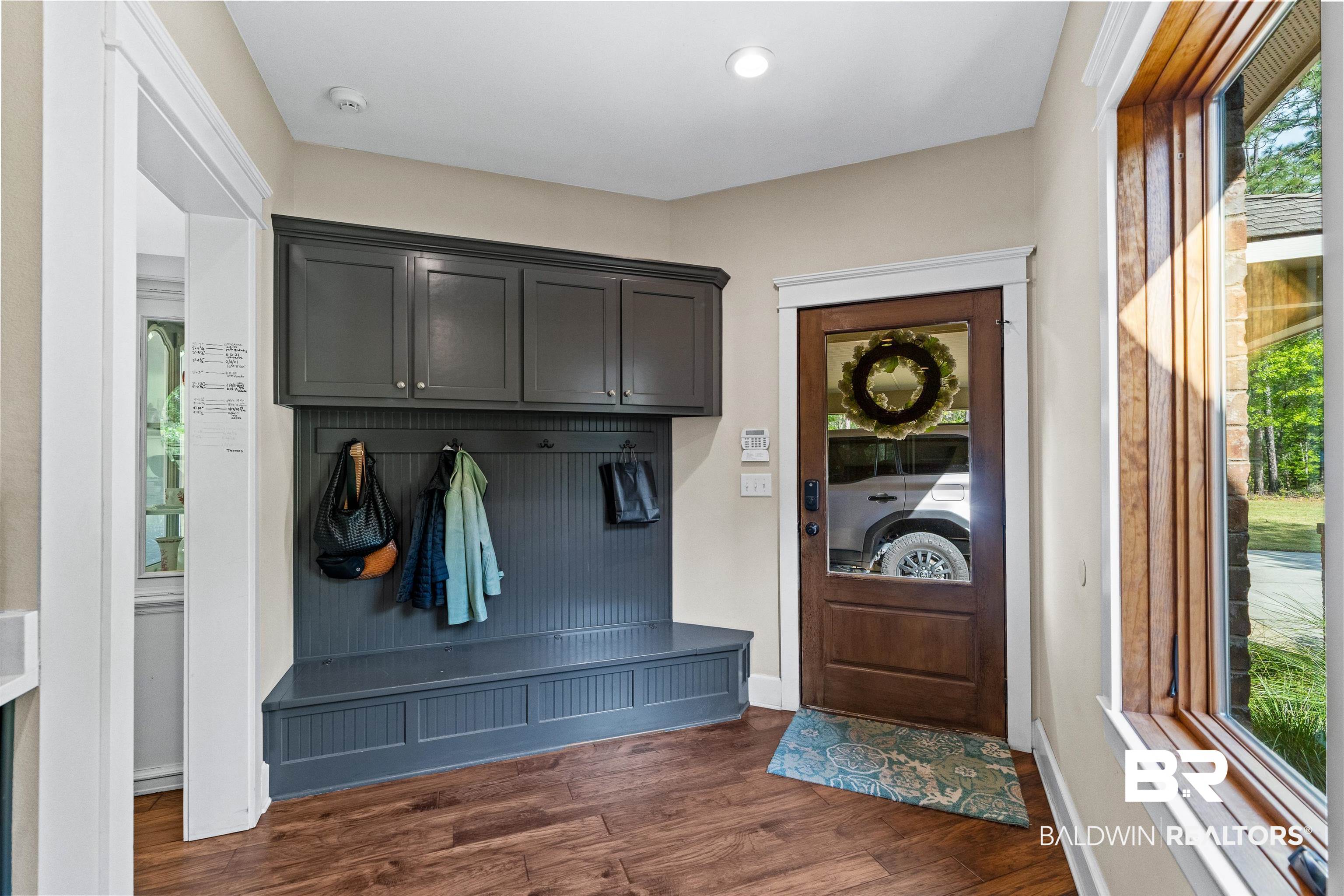 47252 Emmons Road Bay Minette, AL 36507 - Photo 16 of 50 Mudroom with dark wood-type flooring and baseboards