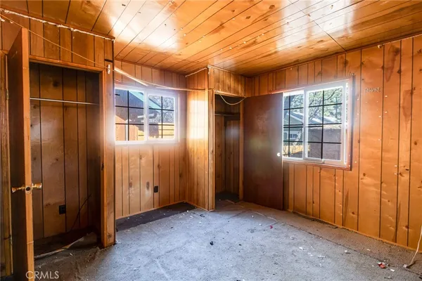 an empty room with windows