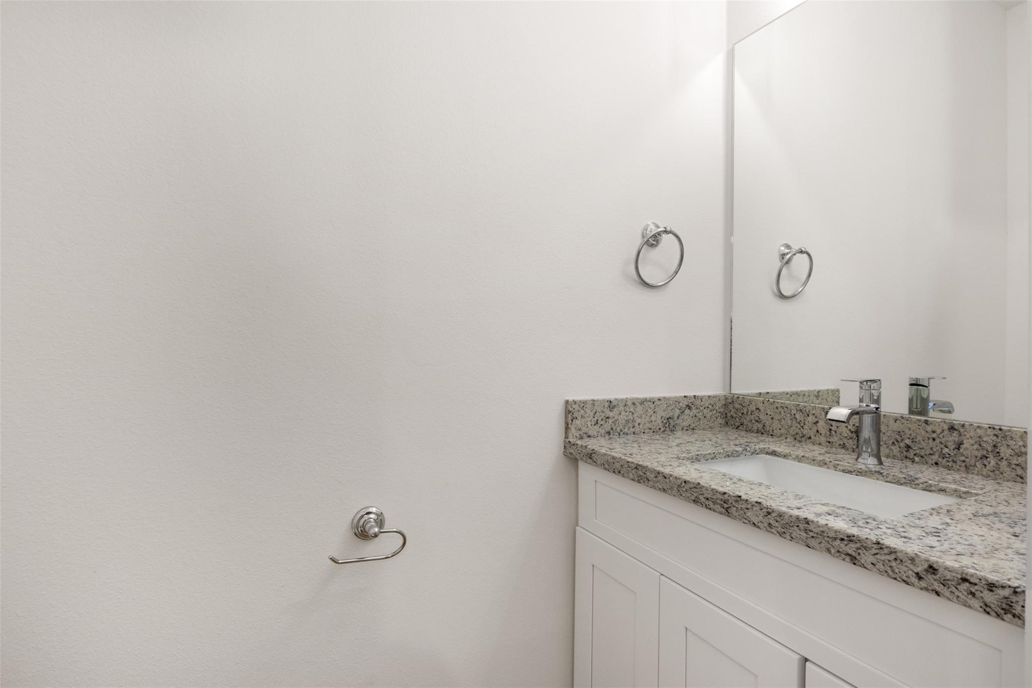 1928 Purswell Road Houston, TX 77055 - Photo 16 of 36 The half bath is conveniently located on the second floor, close to the kitchen and living area for maximum convenience.