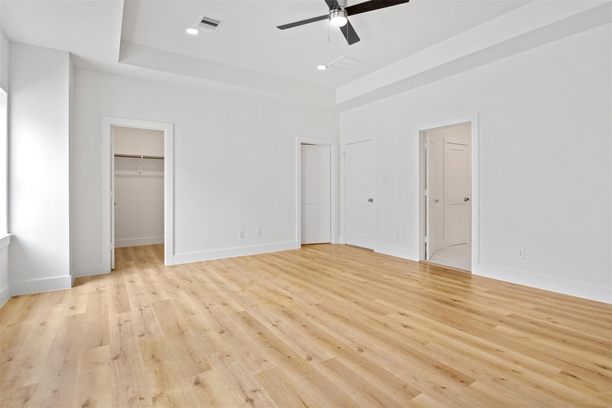 1928 Purswell Road Houston, TX 77055 - Photo 18 of 36 Enjoy the luxury of his-and-hers walk-in closets in the primary suite—thoughtfully designed for comfort, convenience, and a royal touch.