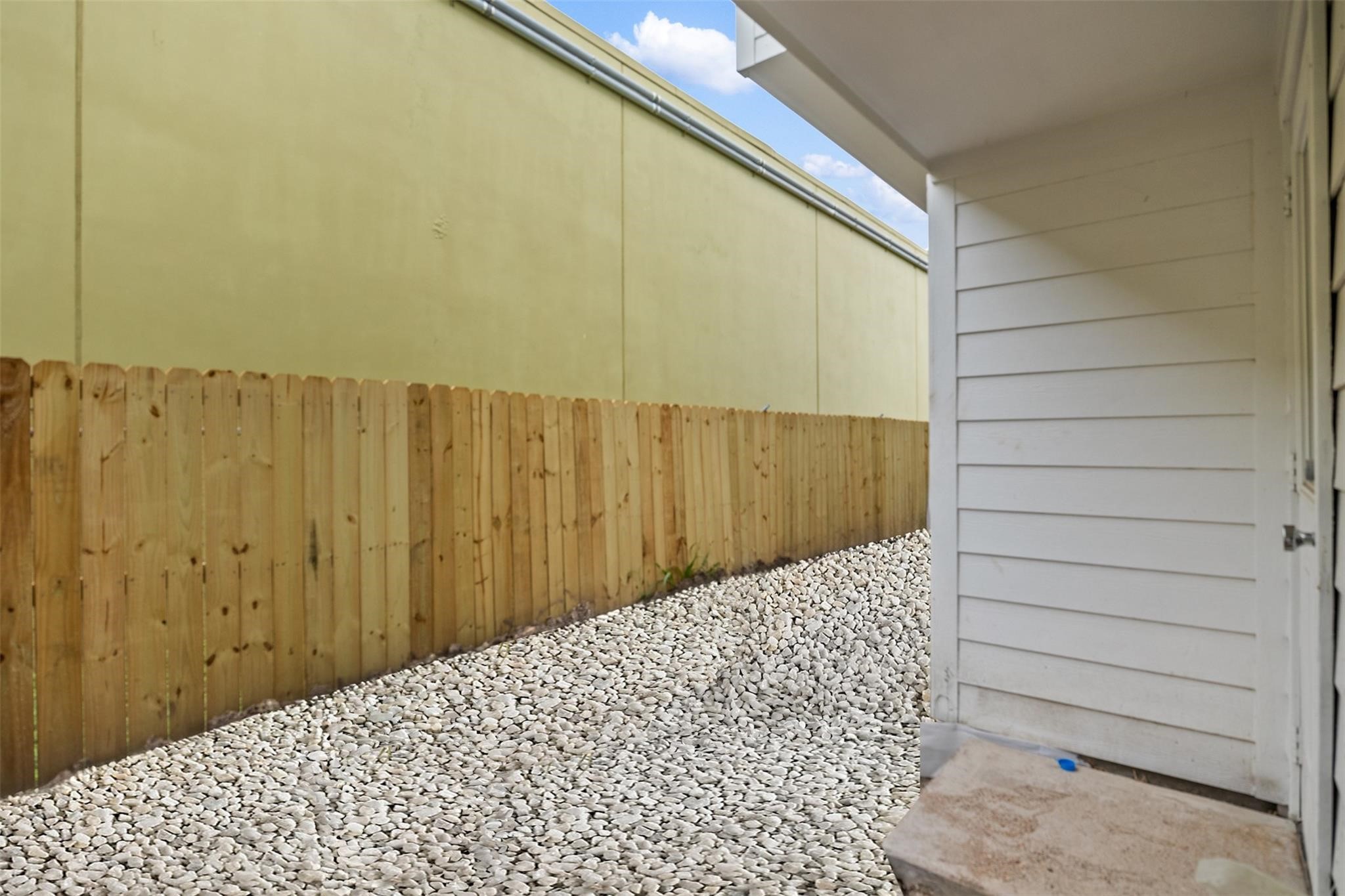 1928 Purswell Road Houston, TX 77055 - Photo 30 of 36 Take a look at your low-maintenance backyard beautifully adorned with stone.