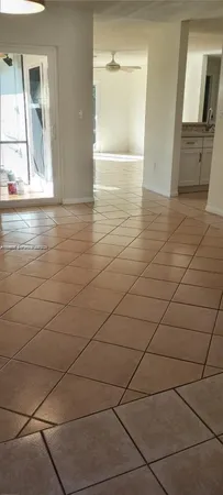 a view of a livingroom with wooden floor