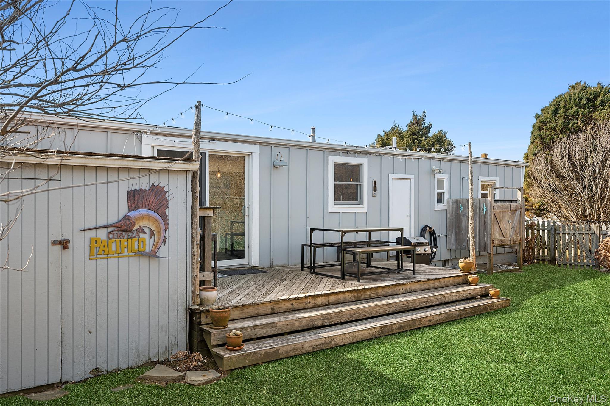 100 Deforest Road, Unit 433 Montauk, NY 11954 - Photo 13 of 26 a house view with a garden space
