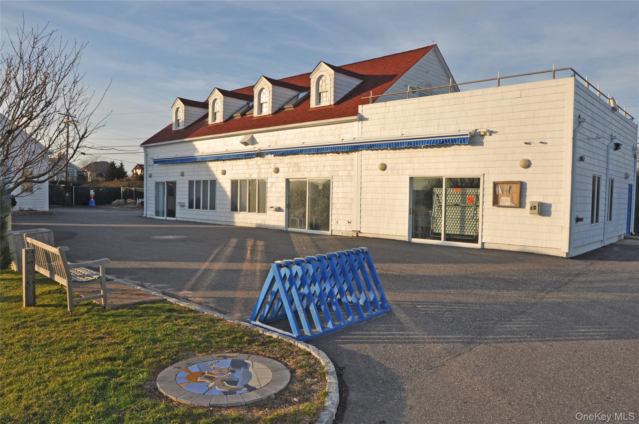 100 Deforest Road, Unit 433 Montauk, NY 11954 - Photo 21 of 26 a house view with a outdoor space