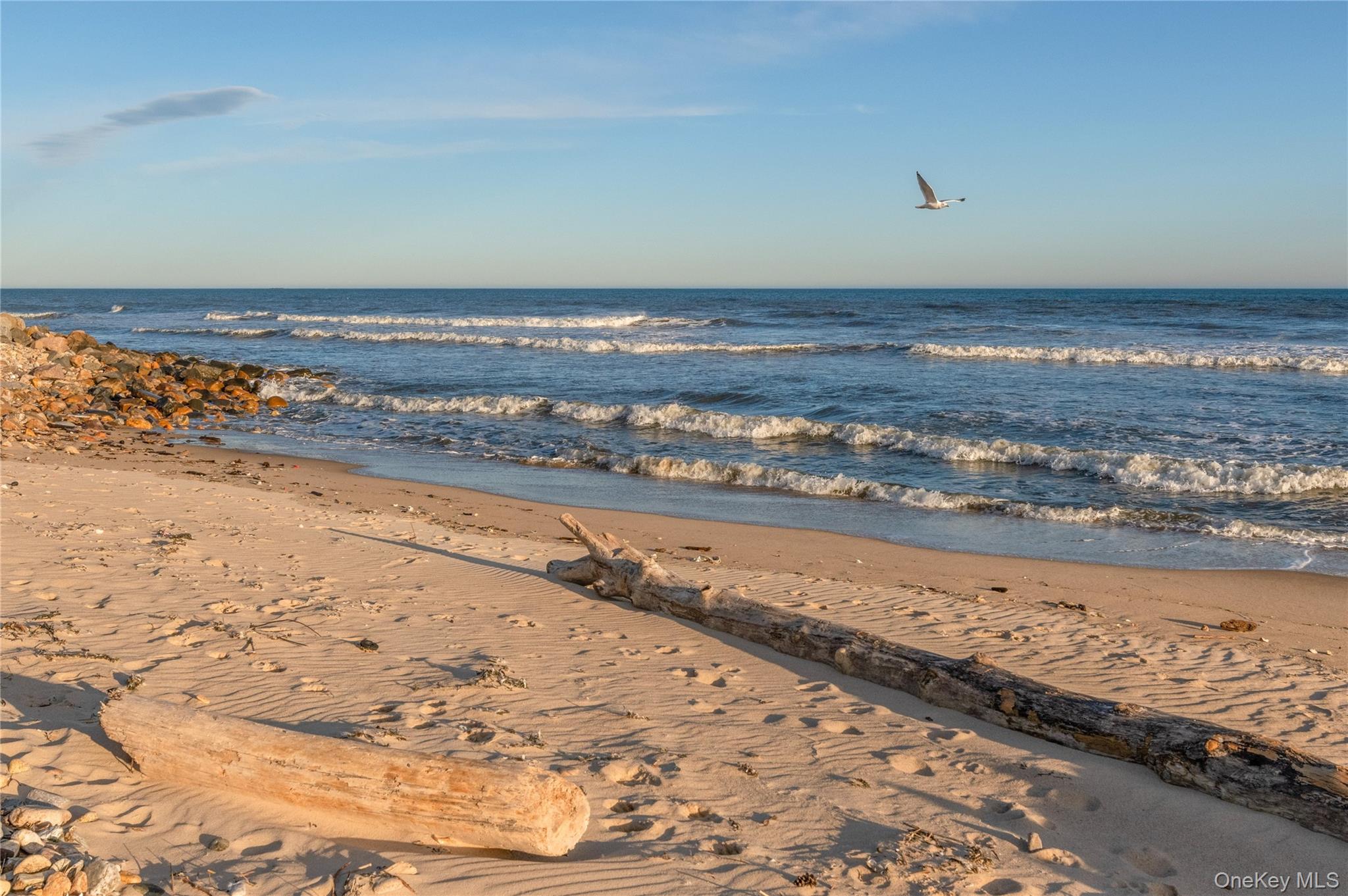 100 Deforest Road, Unit 433 Montauk, NY 11954 - Photo 24 of 26 a view of an ocean beach