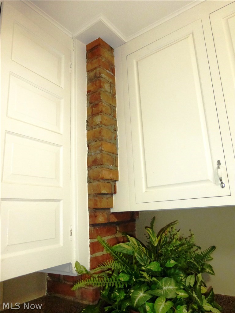 2224 Maplewood Road Cleveland, OH 44118 - Photo 12 of 32 Exposed brick kitchen corner adds a touch of rustic charm.