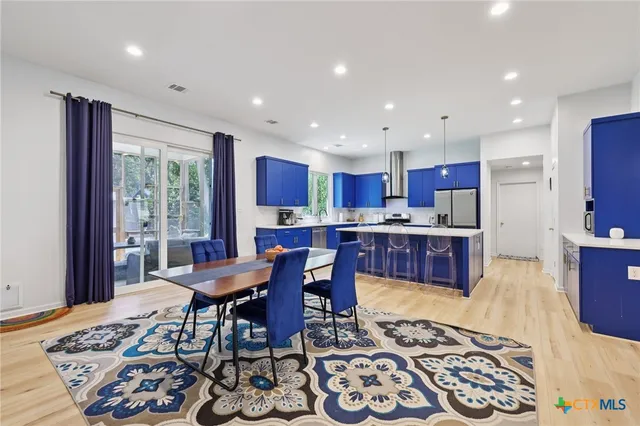 a view of a dining room with furniture
