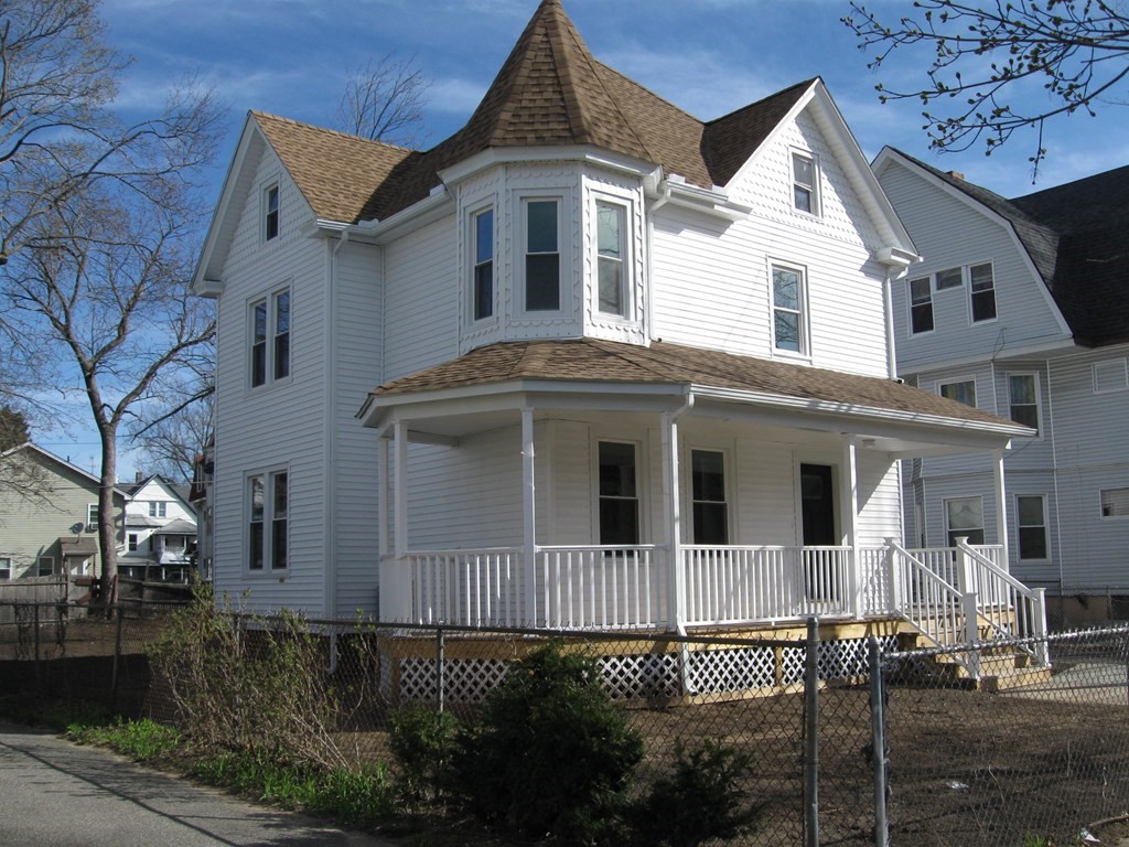 12 Alderman Street Springfield, MA 01108 - Photo 1 of 27 a front view of a house with a yard