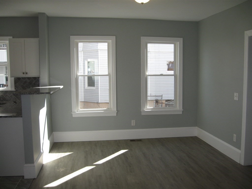 12 Alderman Street Springfield, MA 01108 - Photo 12 of 27 an empty room with windows