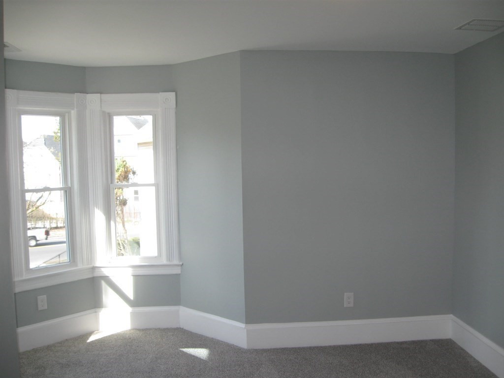 12 Alderman Street Springfield, MA 01108 - Photo 17 of 27 a view of an empty room with a window