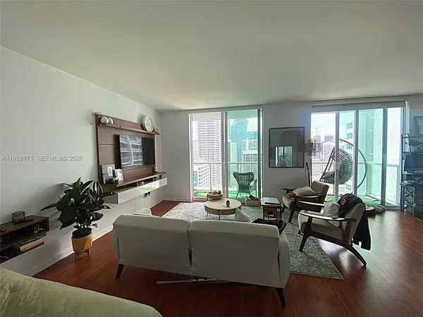 a living room with furniture and a table