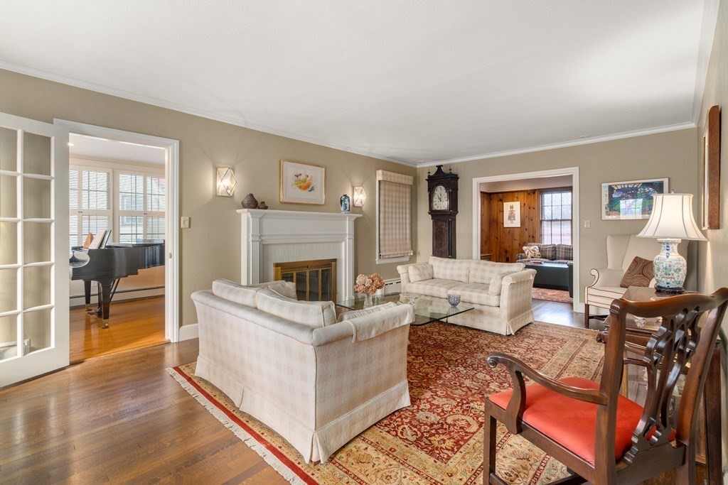 30 Terrace Drive Worcester, MA 01609 - Photo 16 of 39 a living room with furniture a fireplace and a table