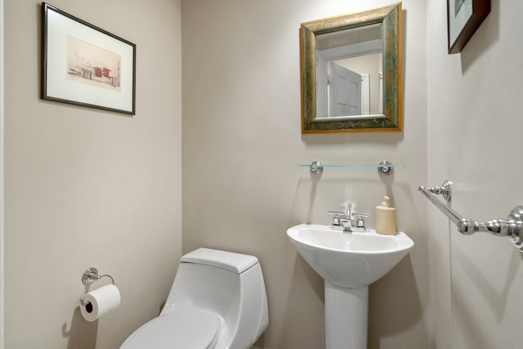 30 Terrace Drive Worcester, MA 01609 - Photo 22 of 39 a bathroom with a toilet sink and mirror