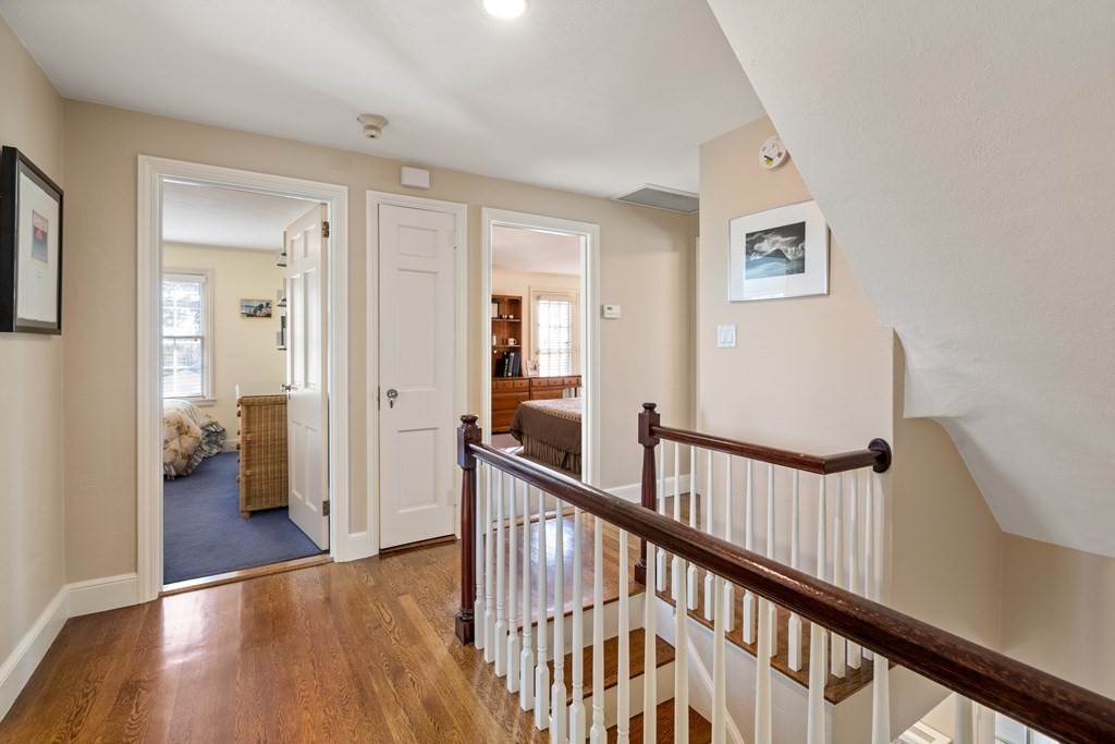 30 Terrace Drive Worcester, MA 01609 - Photo 24 of 39 a view of a hallway with wooden floor and a bathroom