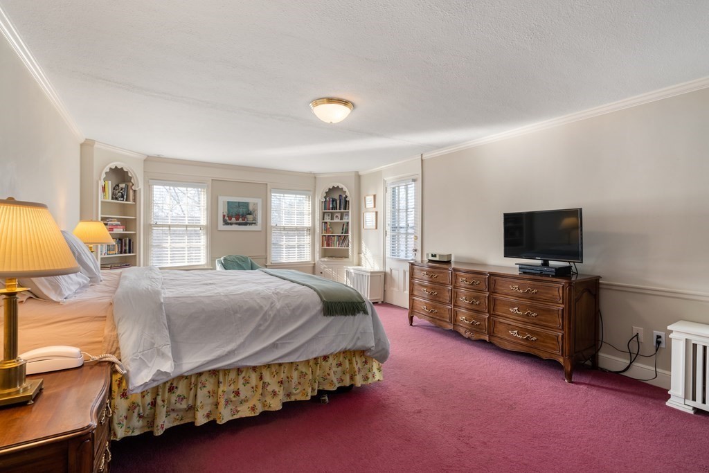 30 Terrace Drive Worcester, MA 01609 - Photo 26 of 39 a bedroom with a bed and flat screen tv