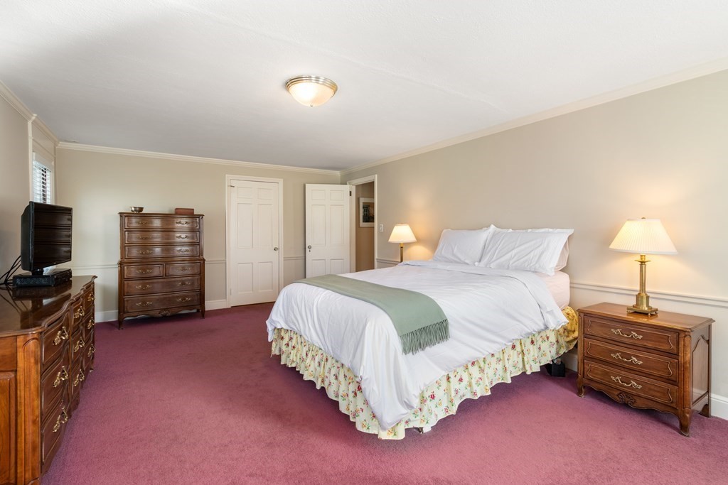 30 Terrace Drive Worcester, MA 01609 - Photo 27 of 39 a spacious bedroom with a bed and a tv