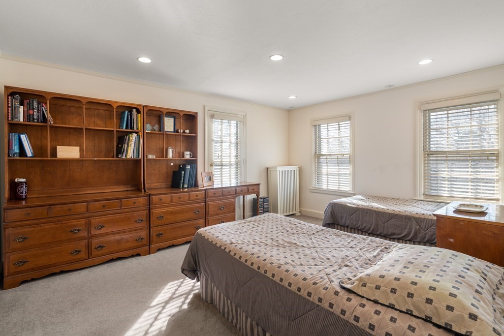 30 Terrace Drive Worcester, MA 01609 - Photo 29 of 39 a bedroom with a bed cabinets and window