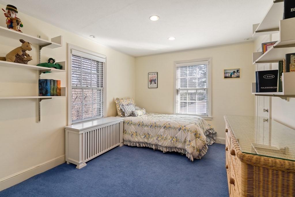 30 Terrace Drive Worcester, MA 01609 - Photo 30 of 39 a room with a bed window and a flat screen tv