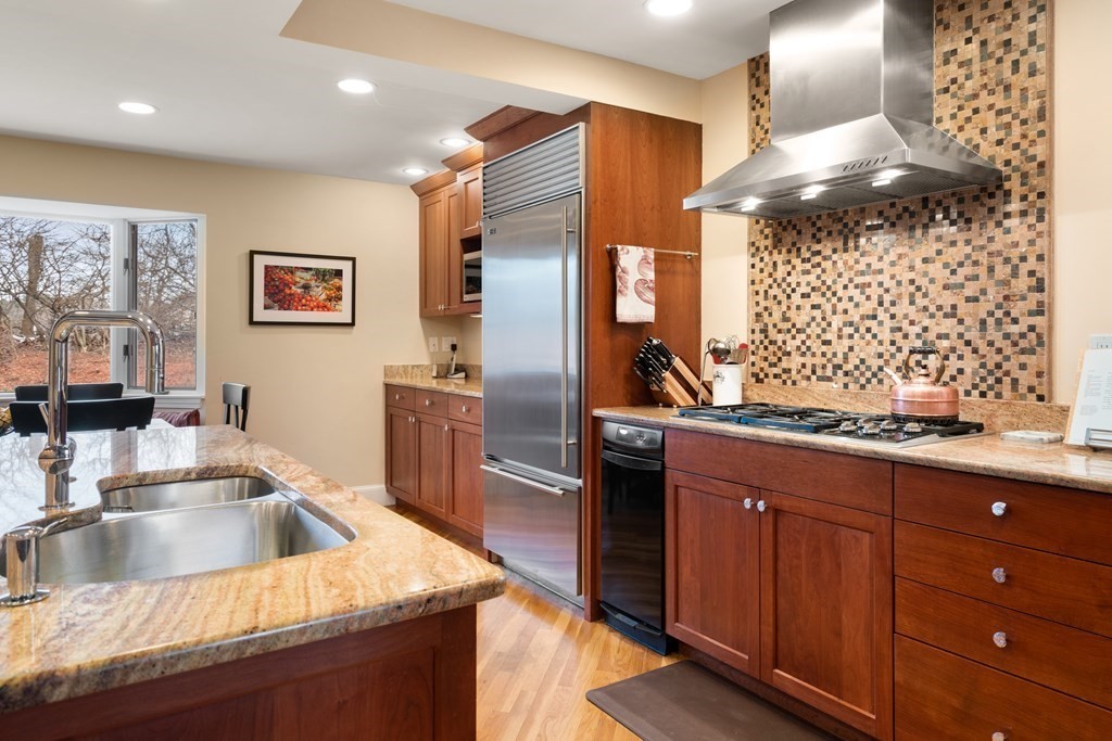 30 Terrace Drive Worcester, MA 01609 - Photo 4 of 39 a kitchen with stainless steel appliances granite countertop a sink stove and refrigerator