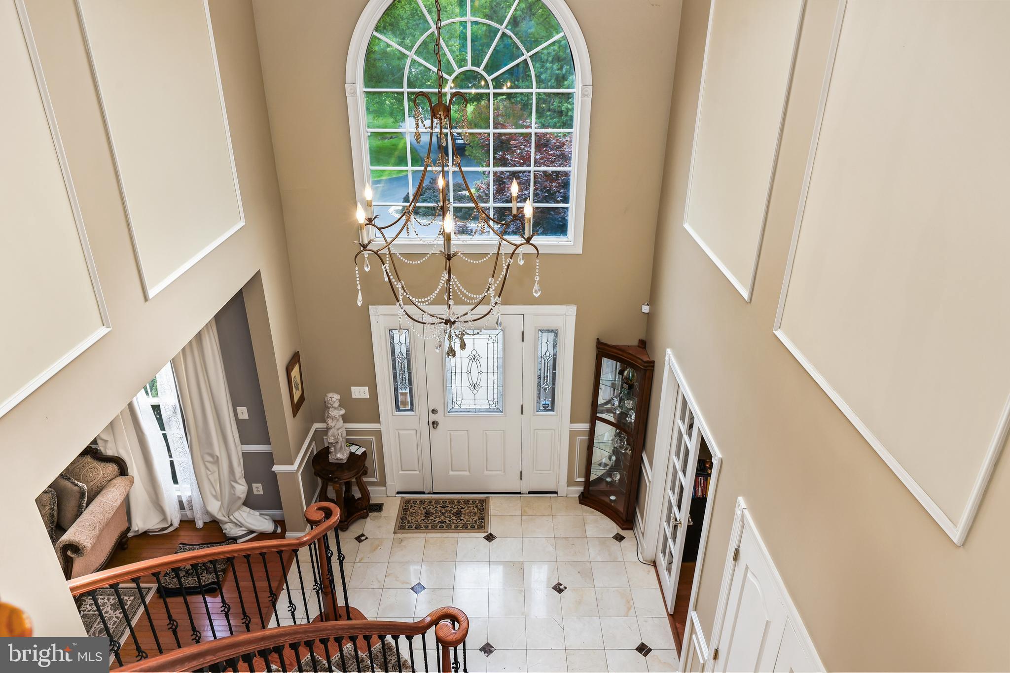 40890 Beechnut Road Leesburg, VA 20175 - Photo 27 of 65 a view of an entryway with staircase